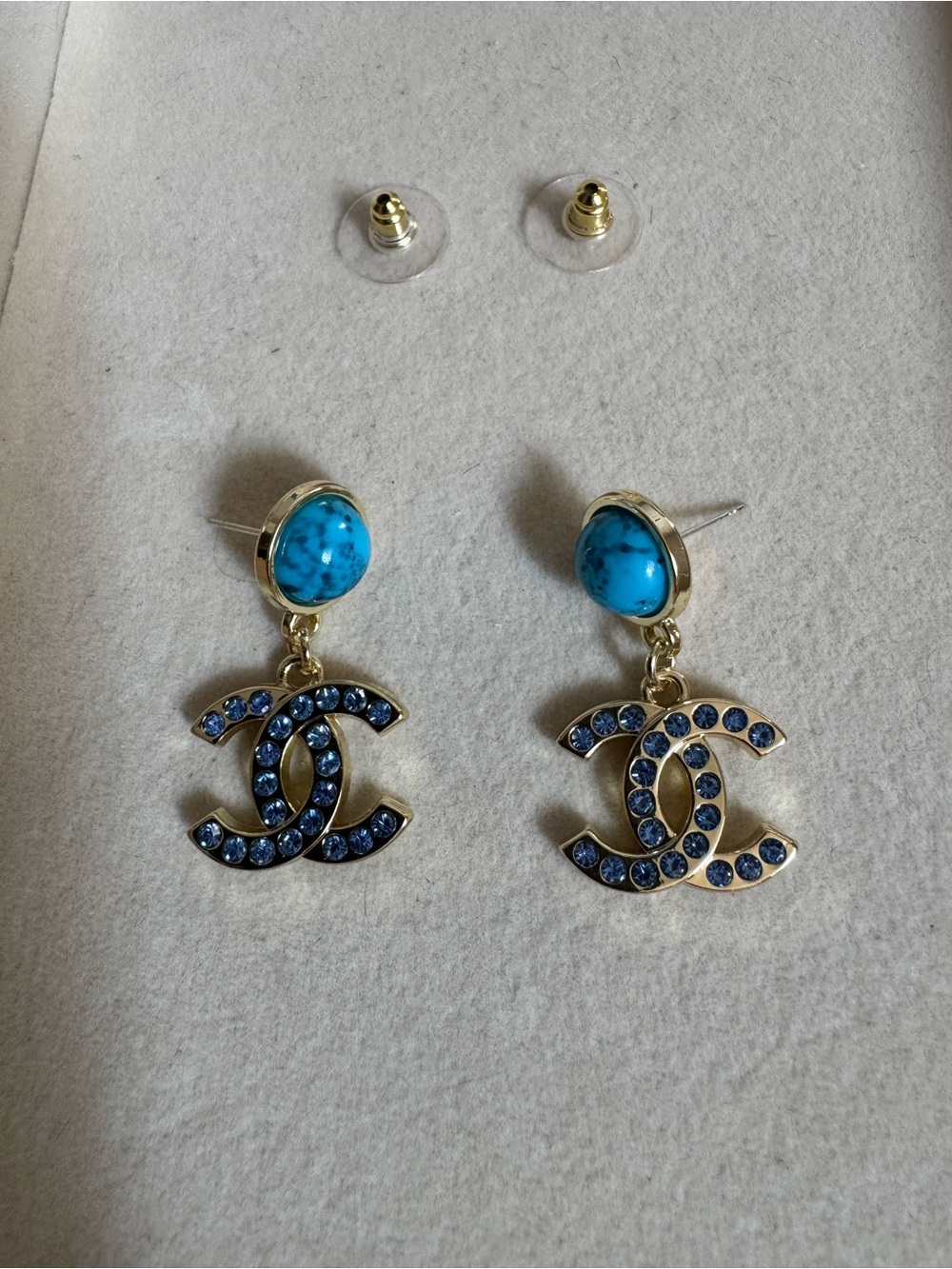 Gold & blue diamond detailed earrings